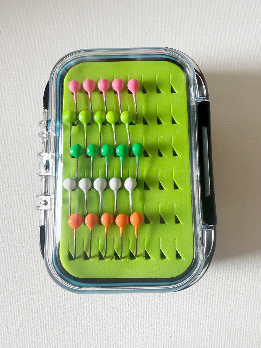 Gem Jigs box loaded with twenty five handcrafted 1/32 oz panfish fishing jigs.