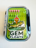 GEM Jigs panfish jig box with official GEM Floats brand sticker on a finished waterproof tackle case.